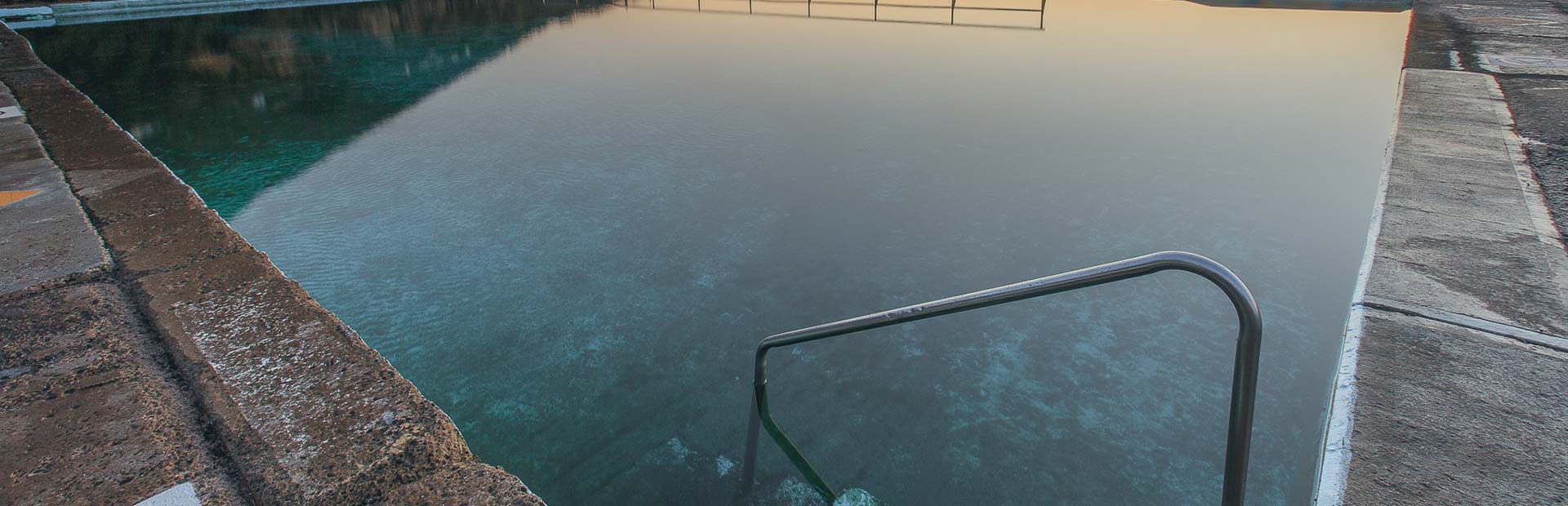 A pool with water on top of it