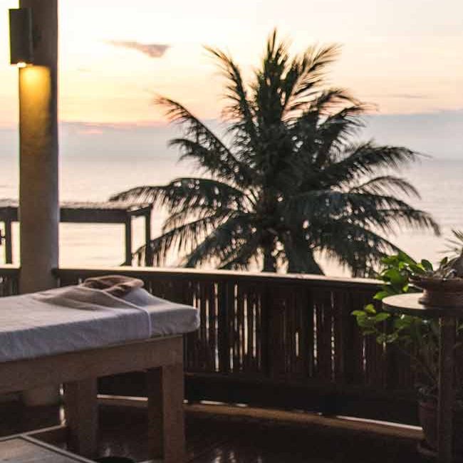 A view of the ocean from an outdoor deck.