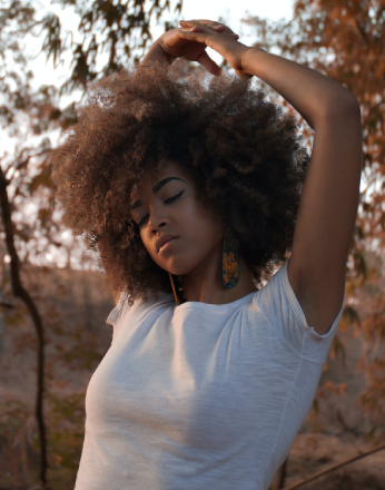 A woman with her hair in the air